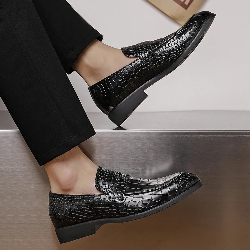Men's crocodile embossed leather loafers with a polished finish, enhancing their formal appeal