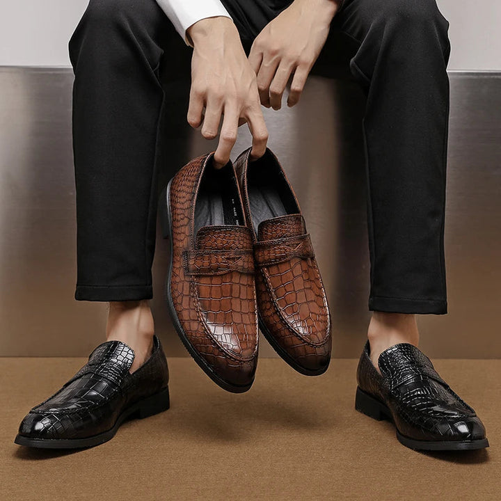 Comfort loafers: men's crocodile embossed leather slip-ons designed for extended wear