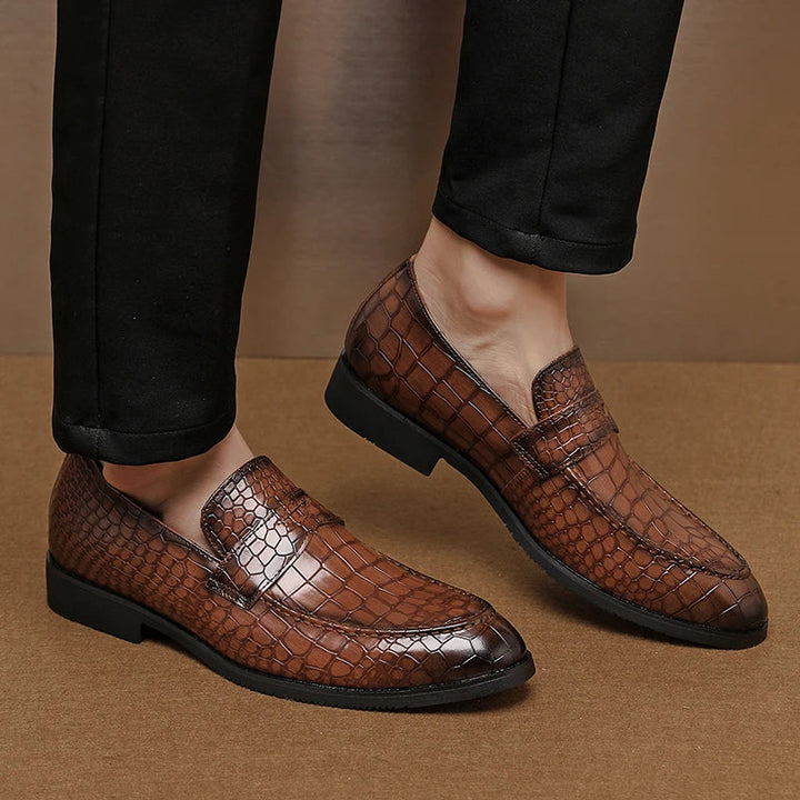 Stylish men's black crocodile embossed leather loafers, ideal for office or formal events