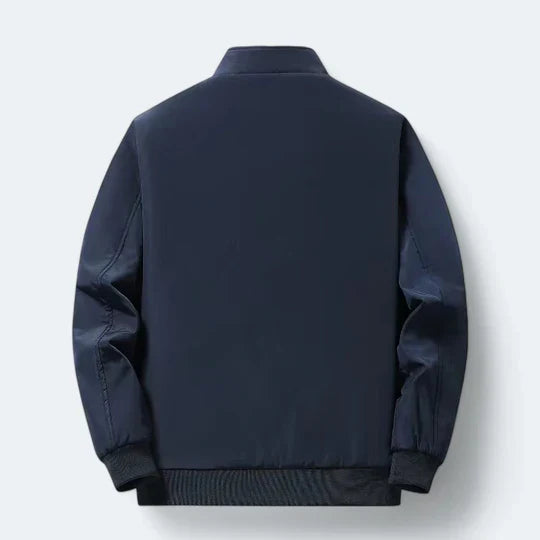 Warm, padded men's comfort jacket in a neutral color, ideal for everyday use and cold weather protection.