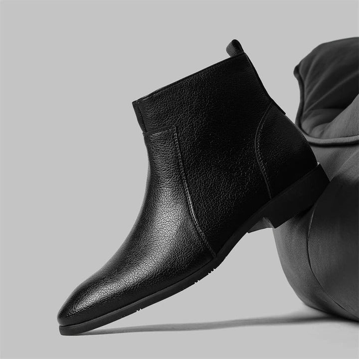 Walk in style with these men's leather ankle boots, showcasing a trendy side zipper and pointed toe