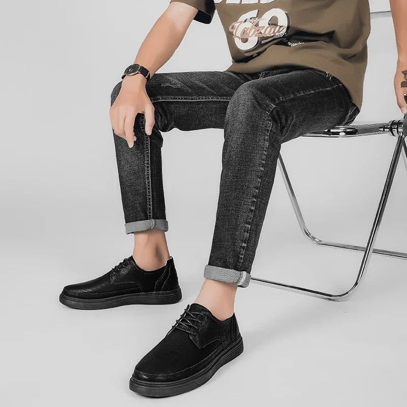 Men's dark brown leather dress sneaker, offering comfort and style for extended wear.