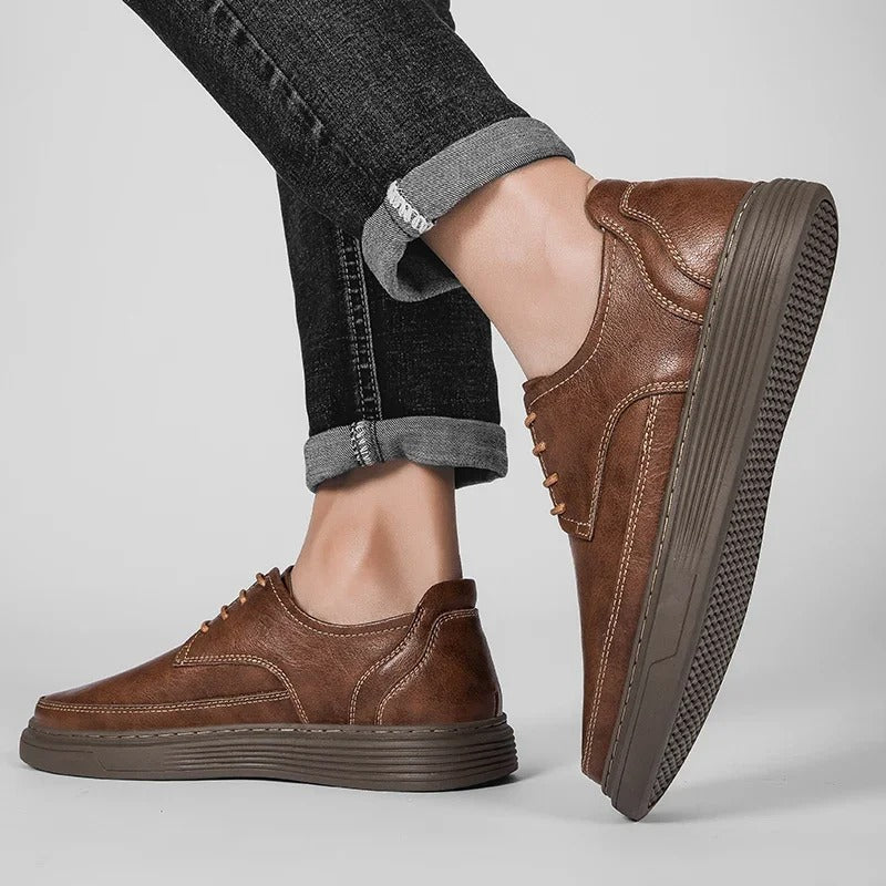 Men's navy leather dress shoe sneaker hybrid, perfect for sophisticated yet relaxed mens fashion.