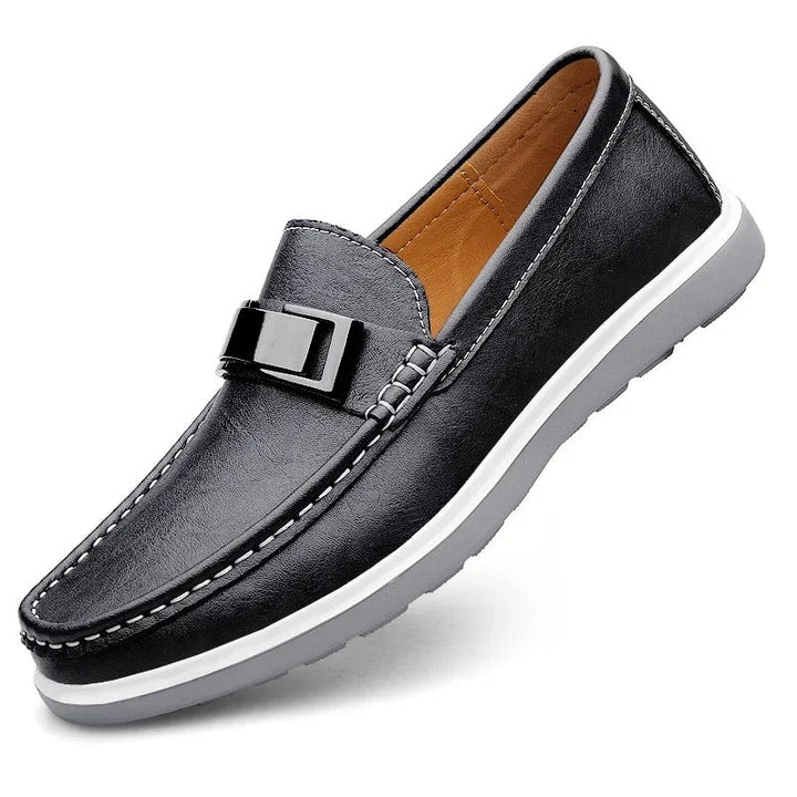Men's leather loafers with a cushioned sole, emphasizing comfortable casual footwear.