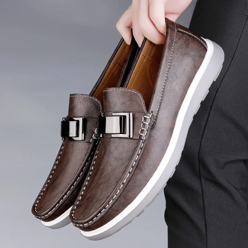 Brown leather loafers for men, stylish and casual, perfect for everyday wear.