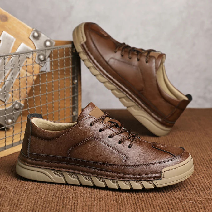 Grey leather lace-up comfort shoes for men, offering versatility and contemporary style