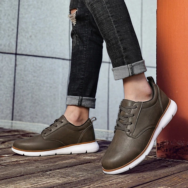 Top-down view of men's brown leather sneakers, emphasizing the overall design and comfortable footbed.