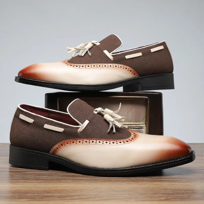 Premium mens black leather tassel loafers, perfect dress shoes with distinctive brogue ornamentation