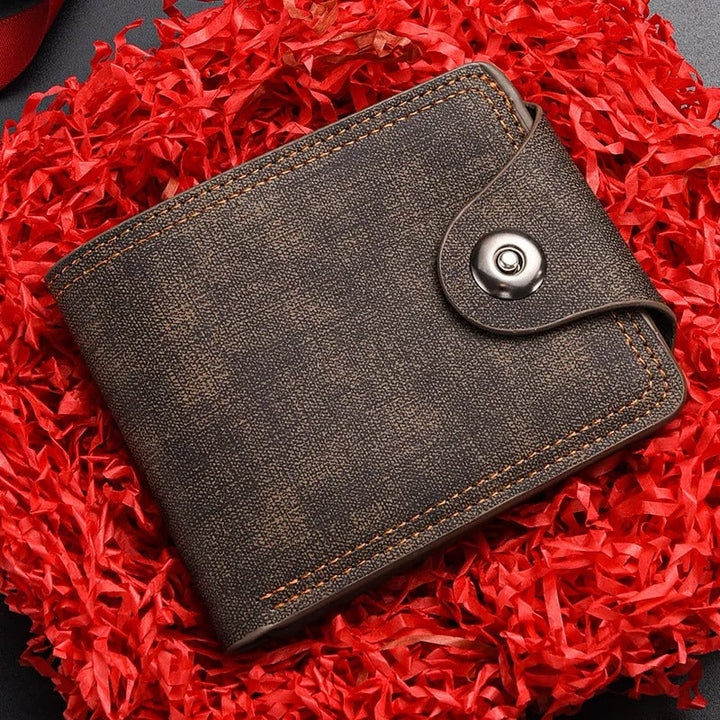 Side profile of a slim men's card holder wallet with a robust snap