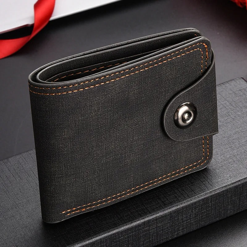 Open men's leather wallet showcasing multiple card slots and secure snap fastening
