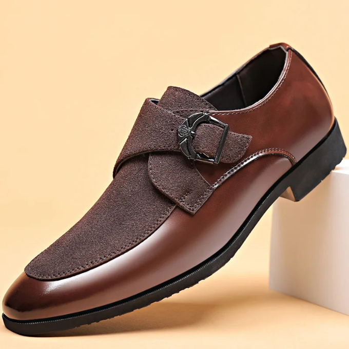 Fashionable black men's buckle loafers in premium leather and suede, a sophisticated footwear choice.