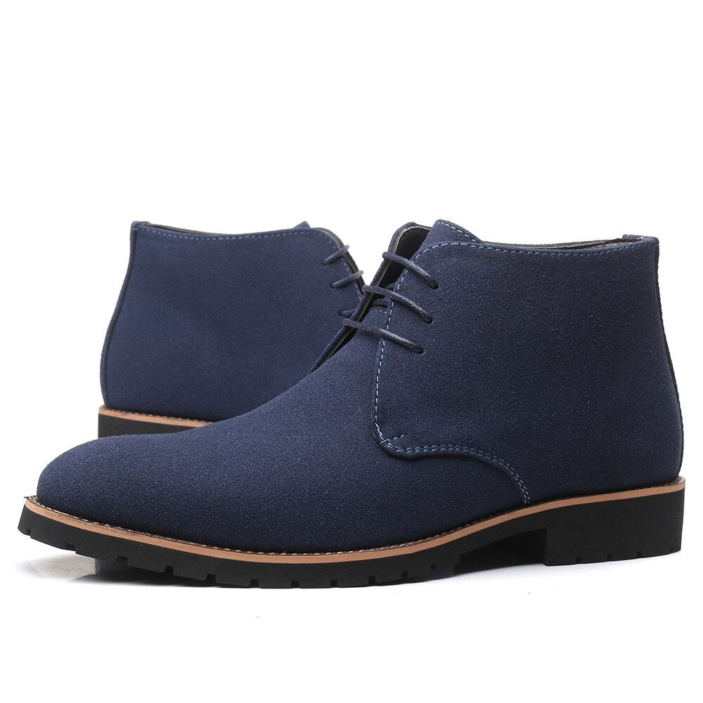 Brown lace-up ankle boots for men, featuring a modern casual design, perfect for versatile outfits.