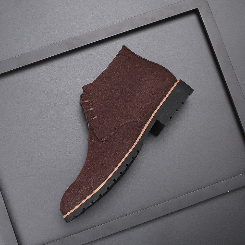 Blue men's ankle boots with laces, offering a modern casual style and comfortable fit.