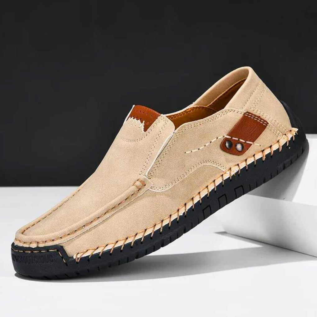 Men's black orthopedic slip-on shoes with arch support for comfortable daily wear and pain relief.