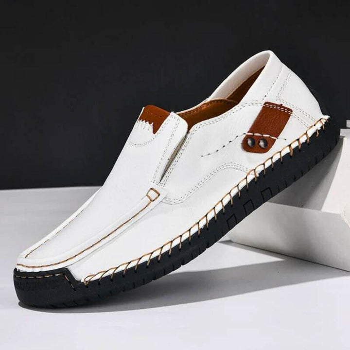 Men's supportive orthopedic slip-on shoes with arch support for pain relief & comfortable walking.