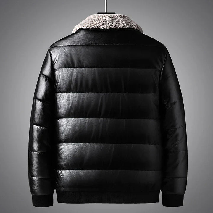 Close-up of a blue men's shearling winter jacket, showcasing the padded detail and soft fleece lining for warmth.