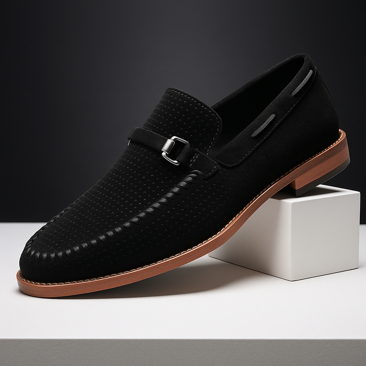 Stylish men's dress shoes: black perforated loafers with a distinctive buckle