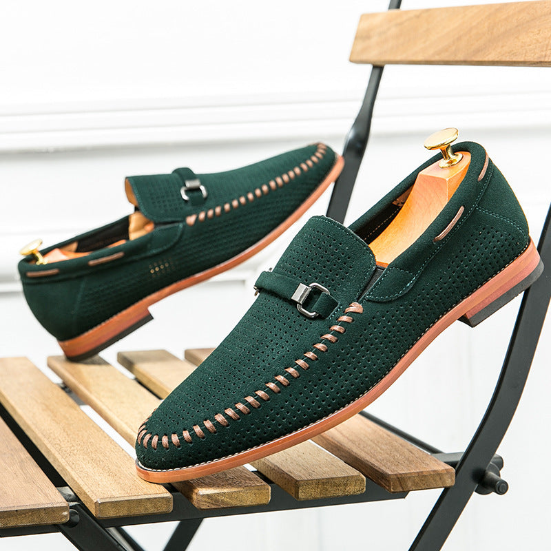 Comfortable men's footwear featuring dark perforated leather and a prominent buckle