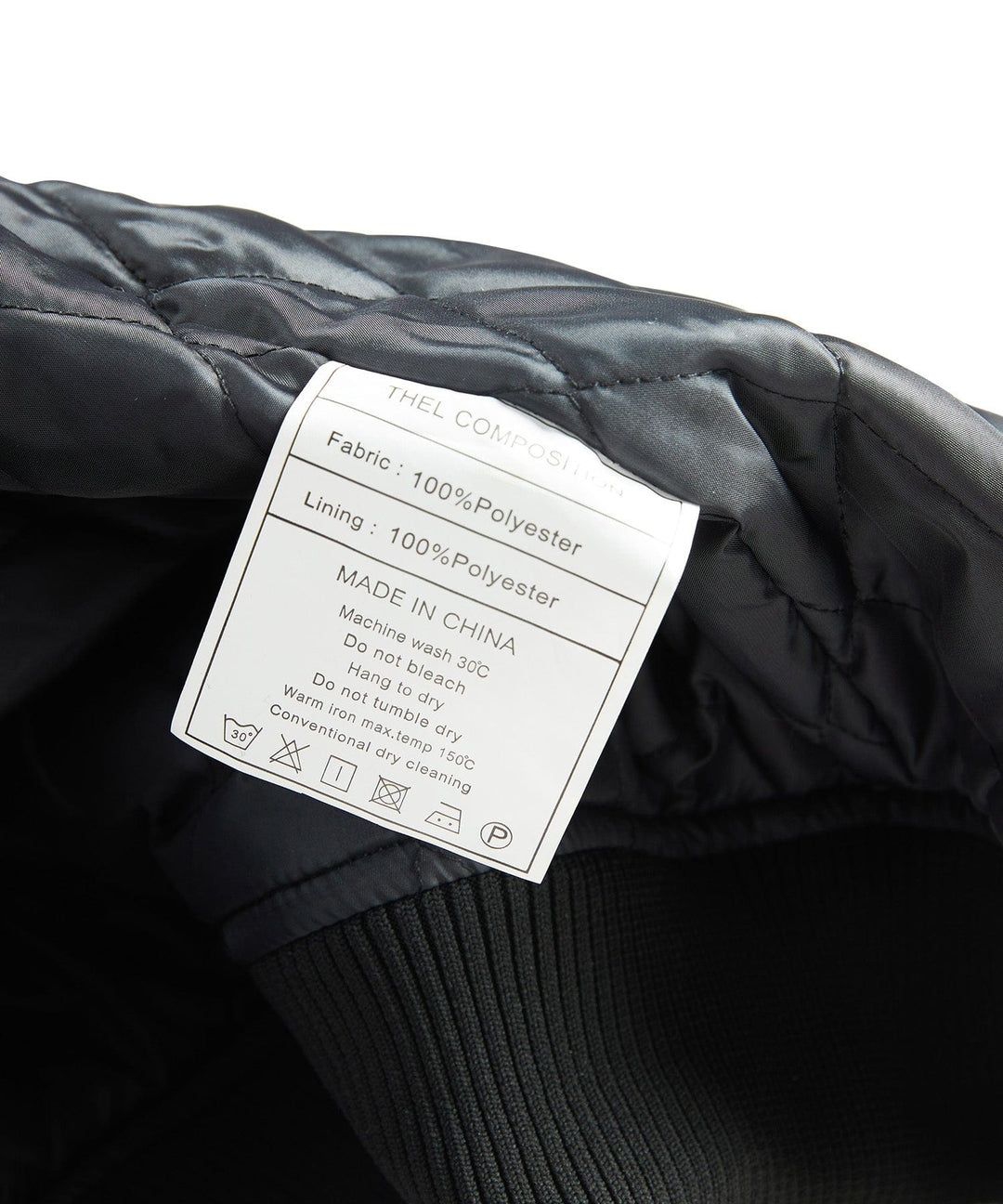 Versatile men's outerwear: black quilted bomber jacket with a cozy sherpa collar for cold weather.
