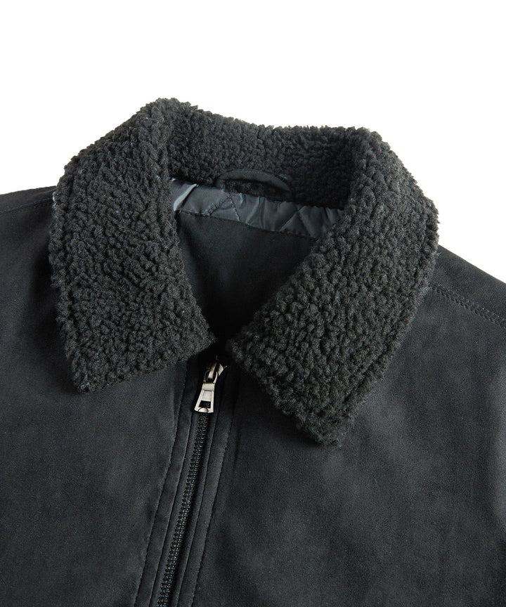Lightweight black quilted bomber jacket for men, designed with a soft sherpa collar for added comfort.