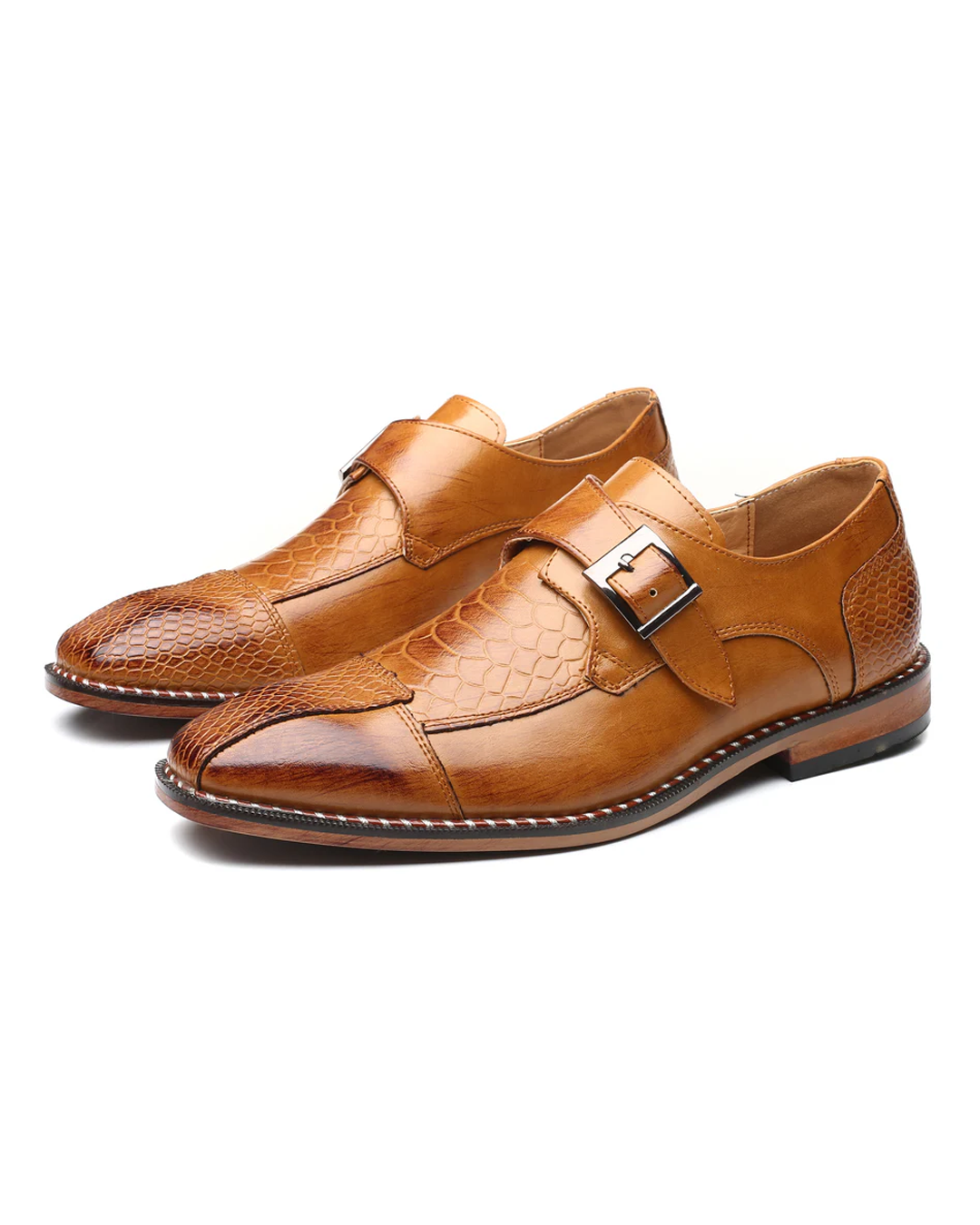 Men's black reptile-textured leather monk strap dress shoes, side view, showing buckle & texture.