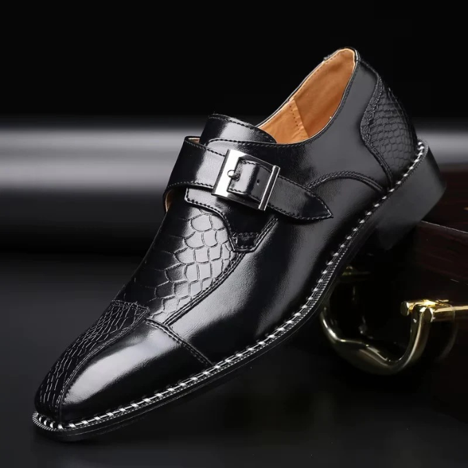 Men's leather reptile-textured monk strap shoes, showcasing craftsmanship & unique pattern.