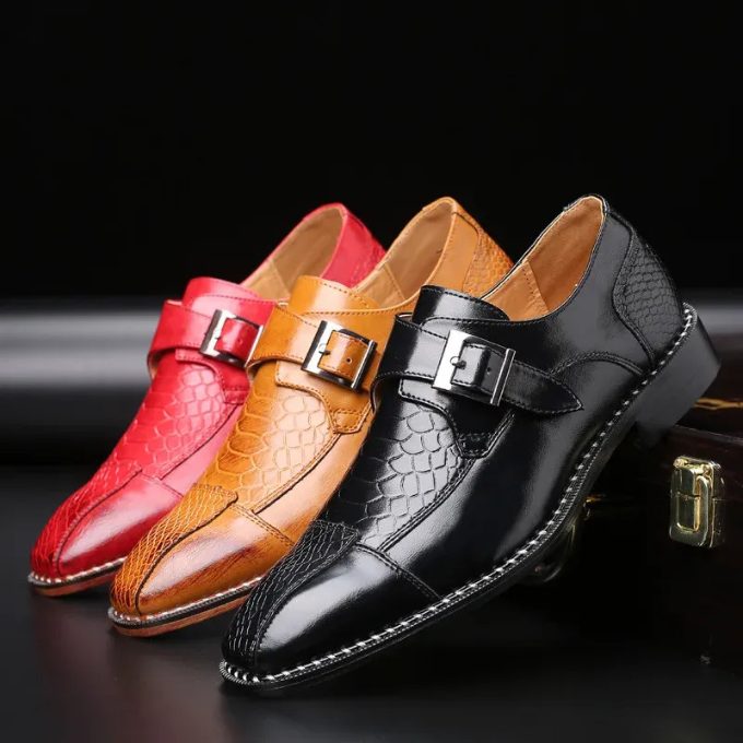 Back view of men's black reptile-textured monk strap shoes, highlighting heel and finish.