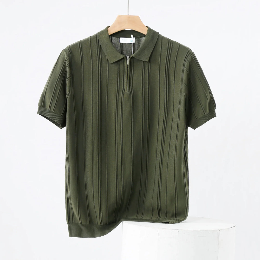 Stylish men's long sleeve half-zip polo in breathable black ribbed knit fabric.