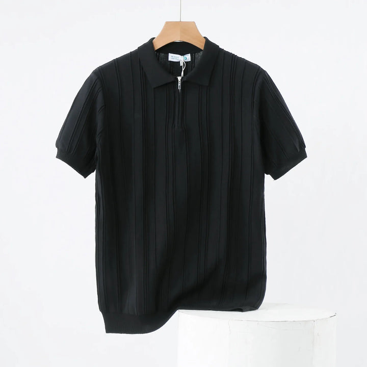 Casual yet refined men's black ribbed knit polo with a functional half-zip neckline.