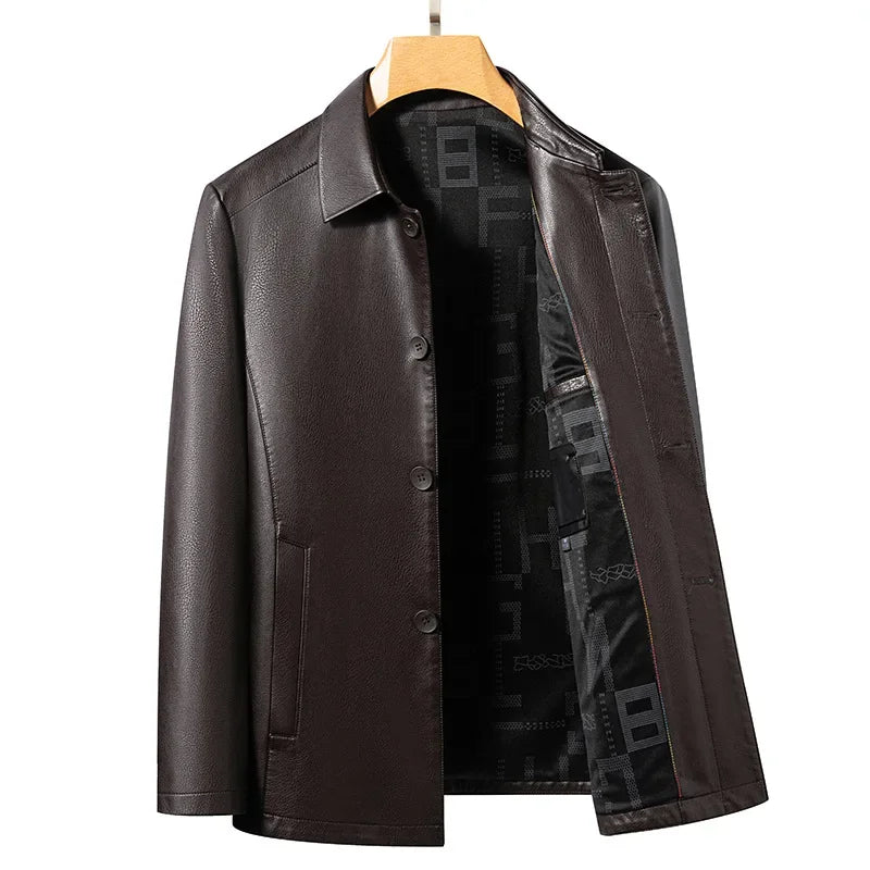 Close-up of pebble-grain vegan leather on a men's moto jacket, black, high quality texture