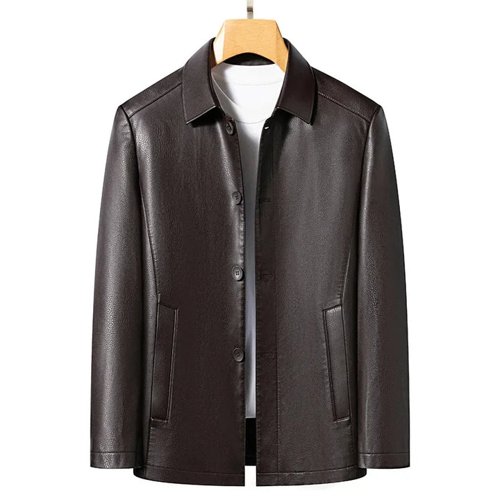 Full length view of a male model wearing a black vegan leather moto jacket, fashionable outerwear