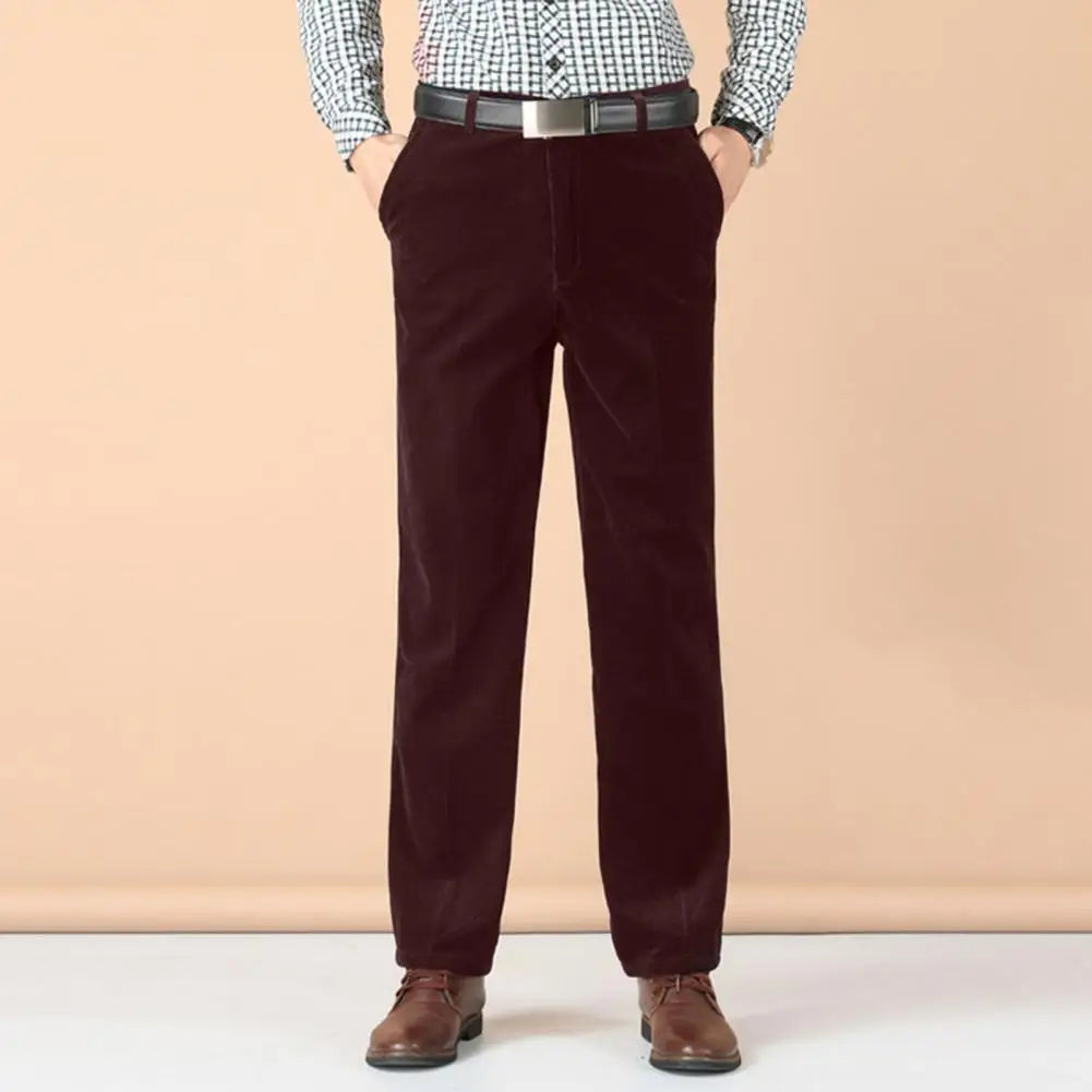 Stylish men's tailored velvet pants in a classic cut, suitable for upscale evening events.