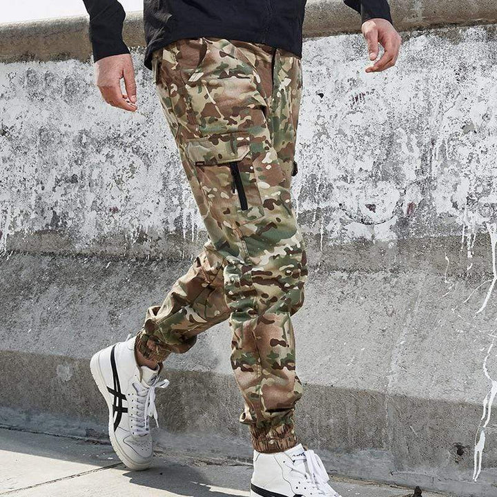 Side view of men's tech jogger pants, demonstrating flexible fit and modern design
