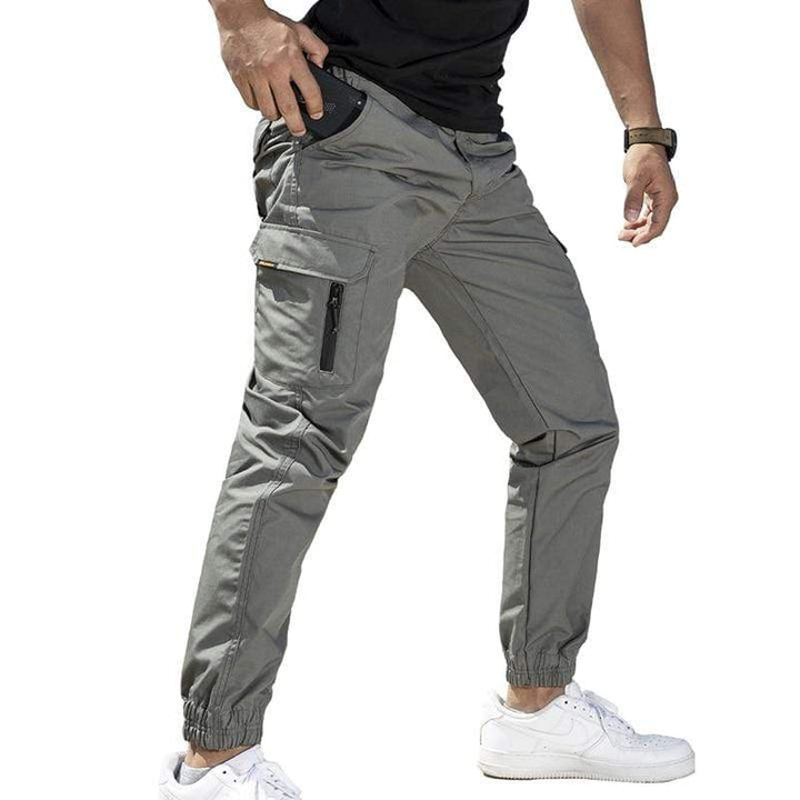 Back view of men's waterproof jogger pants, emphasizing the clean silhouette and comfort