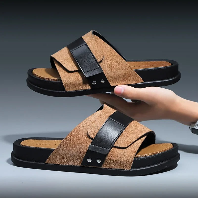 Close-up of men's black suede comfort slide sandals, showing soft upper and cushioned sole