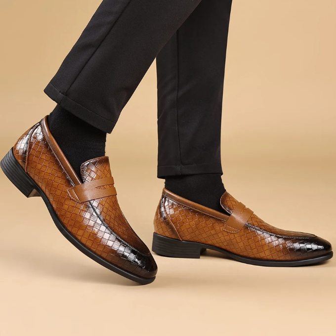 Comfortable men's slip-on loafers made with premium woven brown leather, ideal for daily wear.