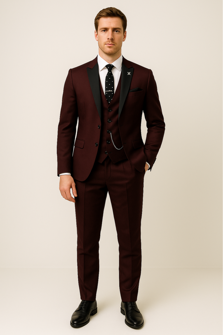 Tailored men's slim-fit burgundy suit, a stylish three-piece formal wear choice for modern fashion.