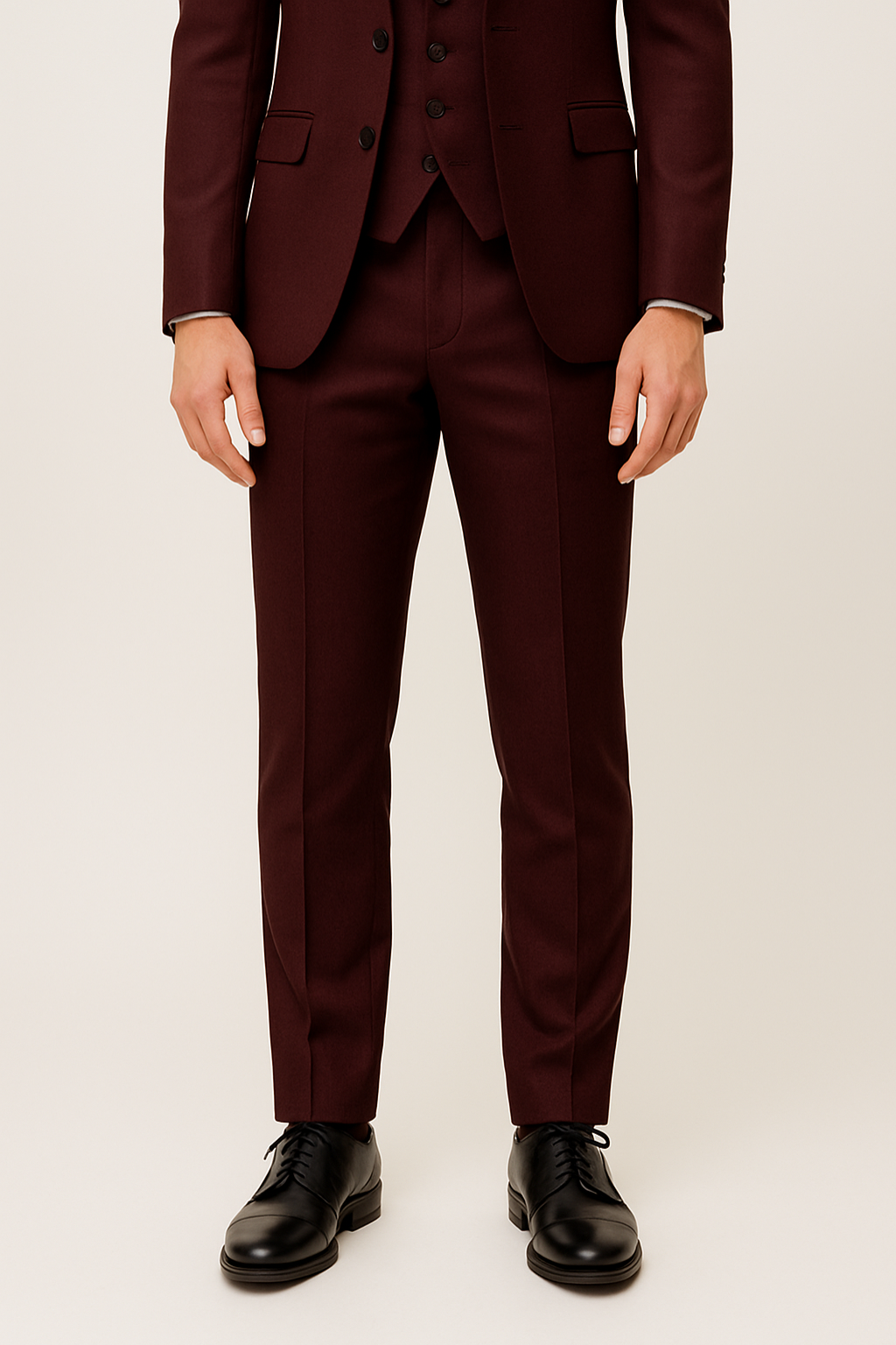 Sophisticated men's burgundy three-piece business suit, also ideal as a wedding or special event outfit.