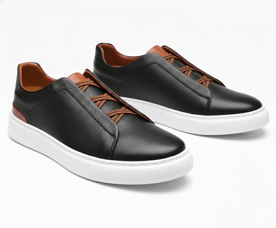 Close-up of the textured leather on men's Capri Comfort slip-on loafers, highlighting craftsmanship.