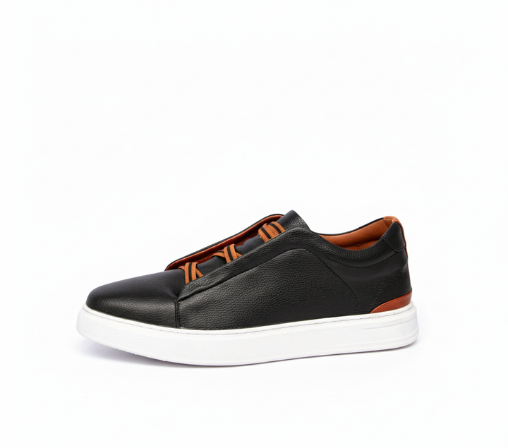 Pair of men's Capri Comfort loafers in a neutral taupe, versatile leather slip-on everyday shoes.