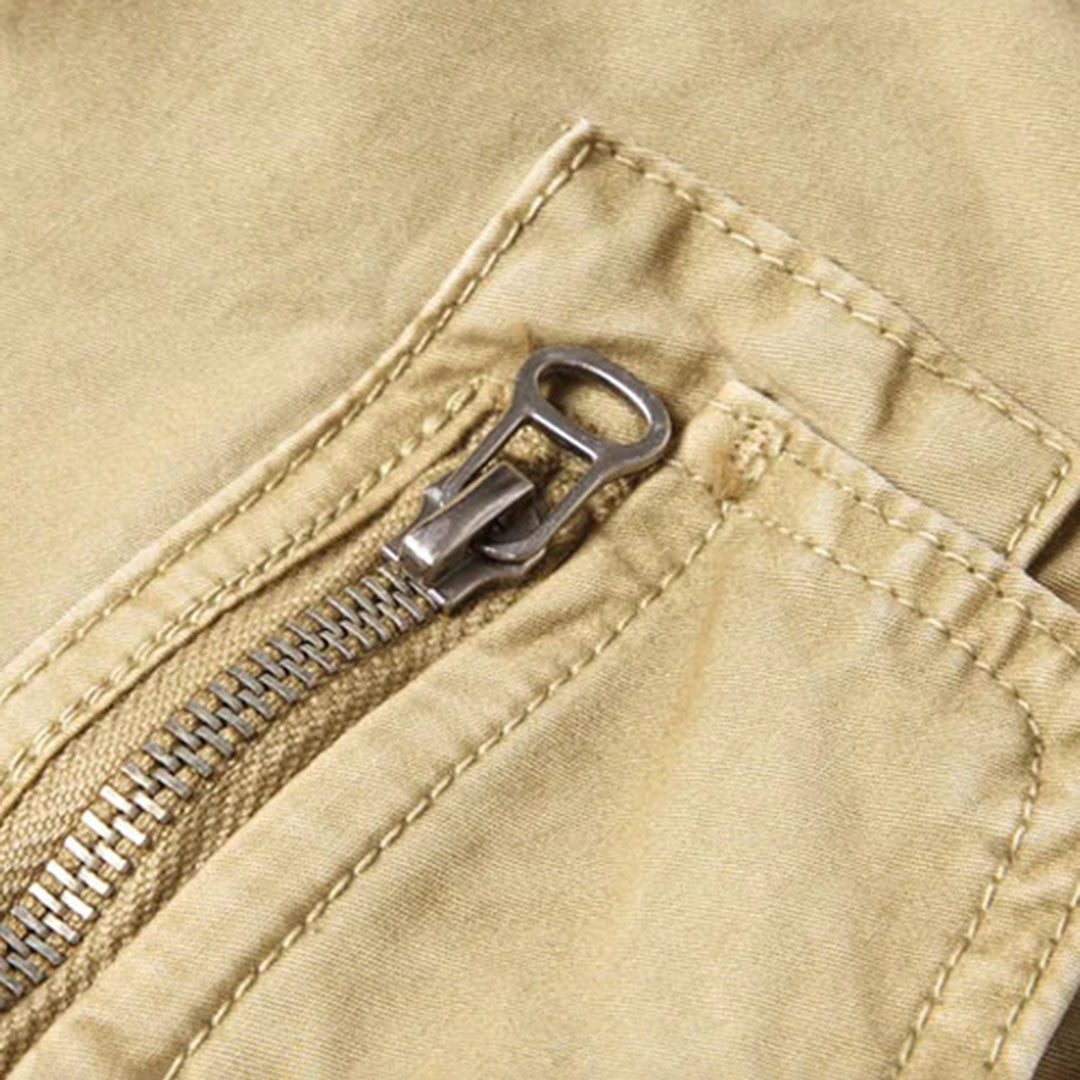 Close-up of the elastic waistband and drawstring on men's casual jogger pants.