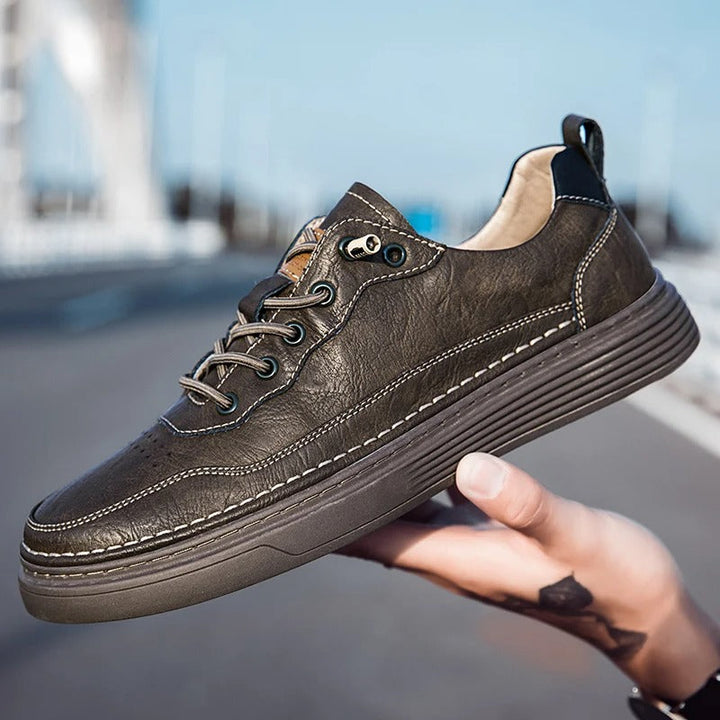 Black leather men's sneakers, versatile casual footwear for walking