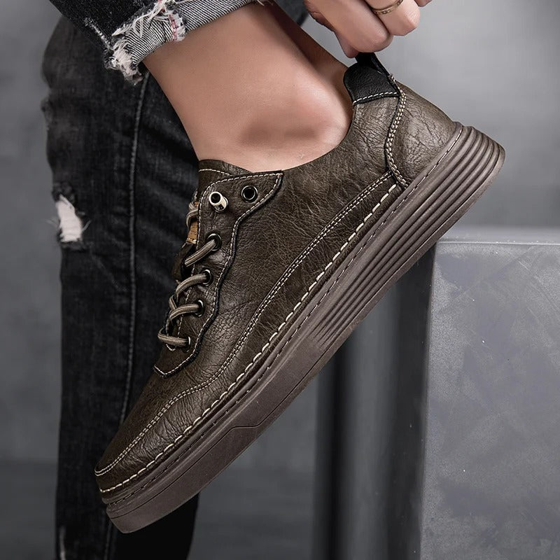 Side view of men's beige leather sneakers with white sole, comfortable