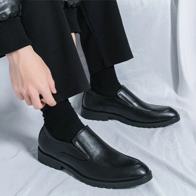 Men's dressy casual slip-on loafers in a rich burgundy, blending comfort with sophisticated style.