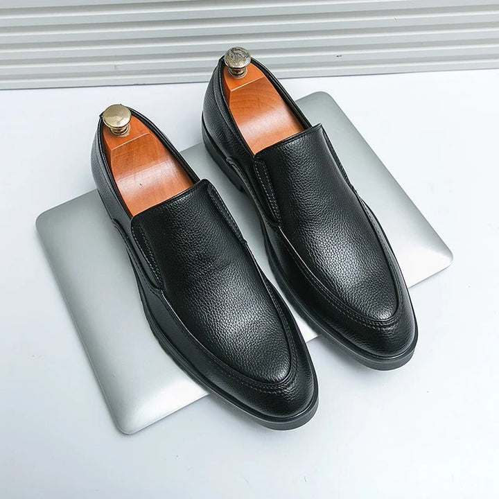 Overhead shot of a pair of men's slip-on comfort loafers, ready for casual or semi-formal wear.