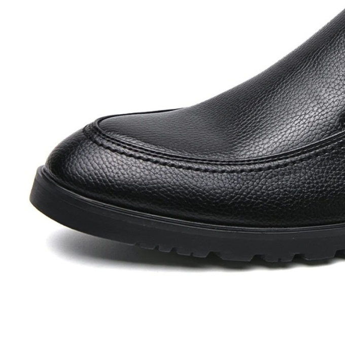 Men's comfort slip-on loafers in a neutral taupe, a versatile footwear option for any casual outfit.