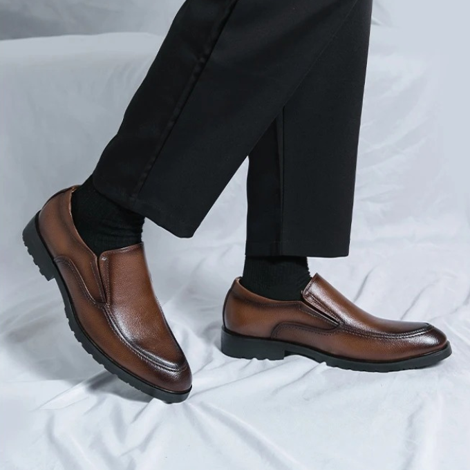 Tan men's comfort loafers with a slip-on design, ideal footwear for casual fashion and everyday wear.