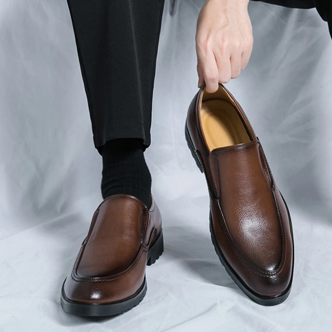 Pair of gray slip-on loafers for men, designed for ultimate comfort and versatile casual styling.