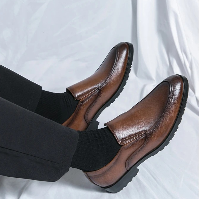 Navy blue men's casual comfort slip-on loafers, a smart footwear choice for versatile fashion.