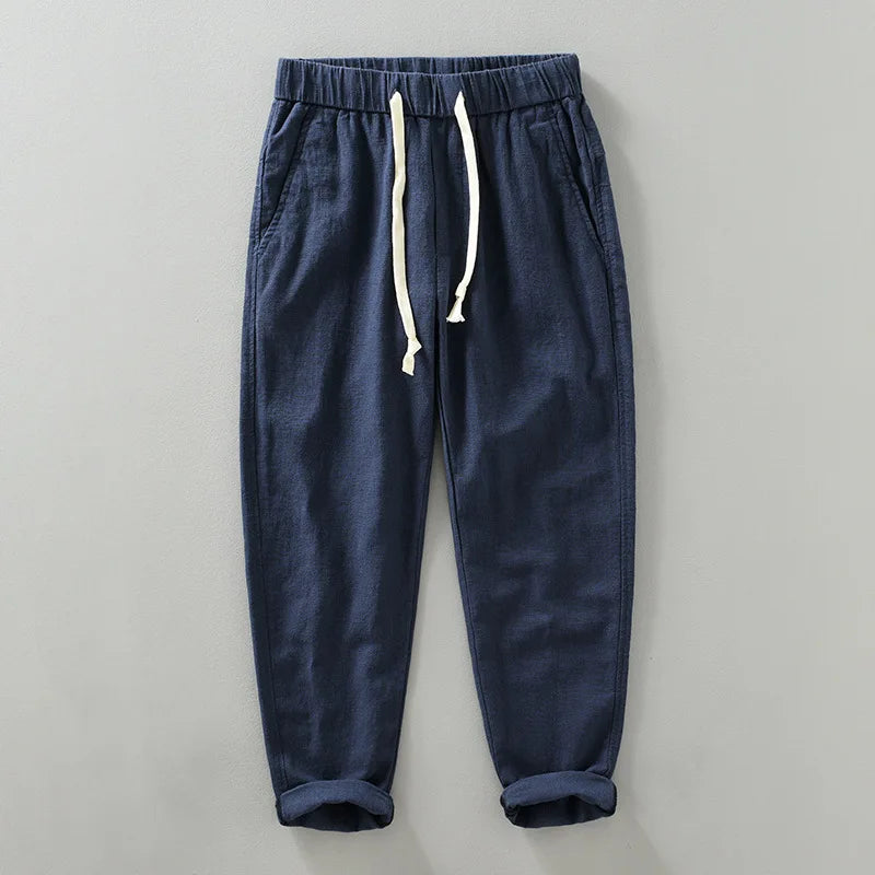 Close-up of the texture of men's cotton linen blend jogger pants, highlighting the fabric.